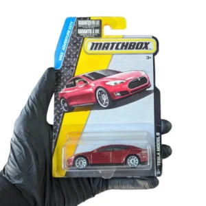 2015 Matchbox MBX Adventure City Tesla Model S (card damaged)